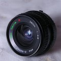 RMC Tokina 28mm 1:2,8 -przyjemna metalowa i naprawdę solidna konstrukcja. Powłoki antyodblaskowe w należytym stanie i ponoć dobrej jakości. Pod słońce nie miałem okazji sprawdzić.